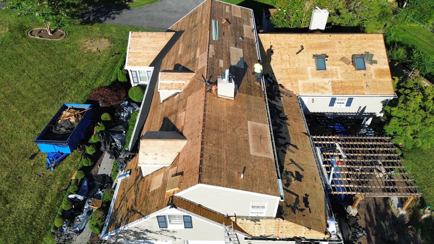 Do You Have to Remove Old Shingles Before a New Roof?