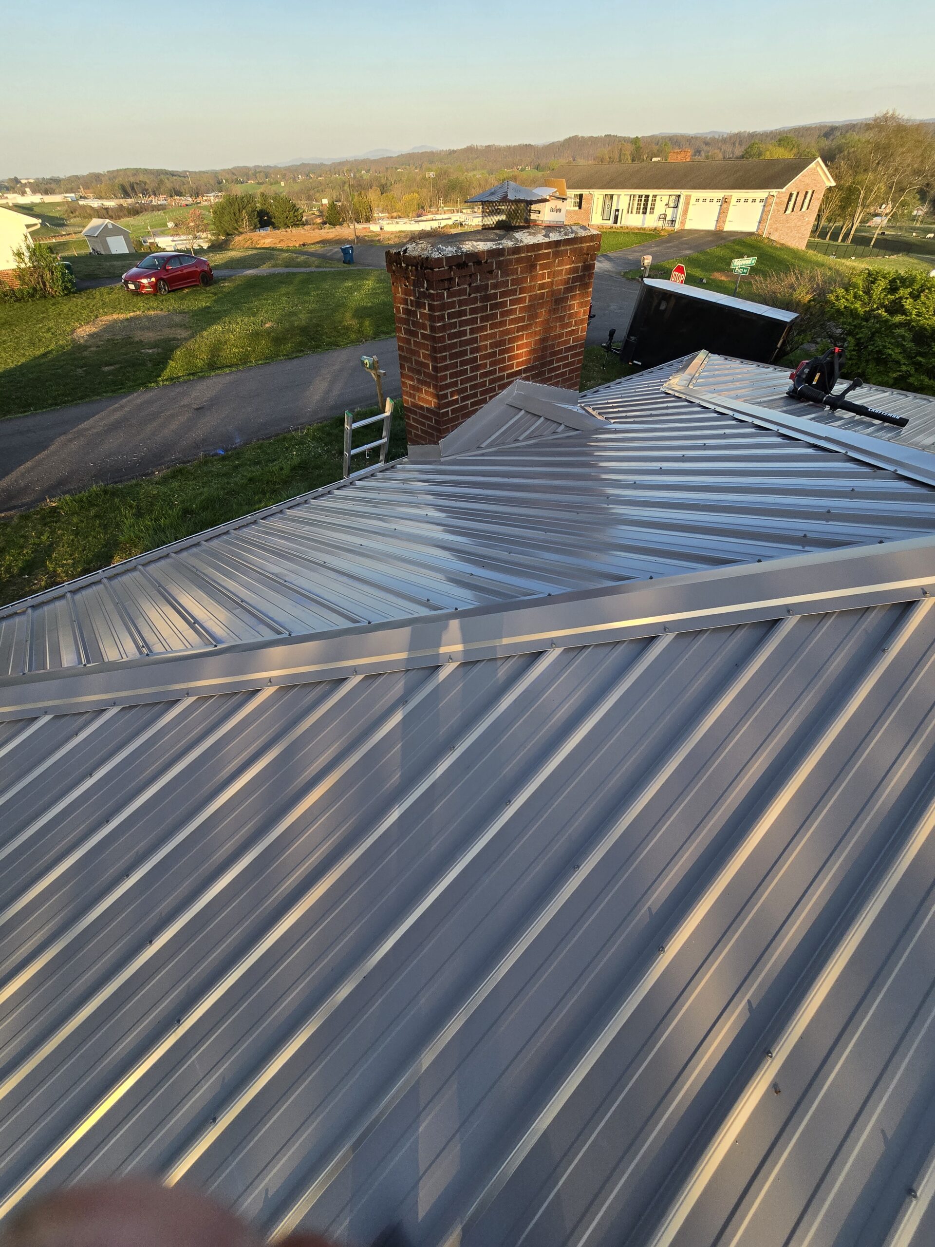 Metal roof replacement with a covered porch